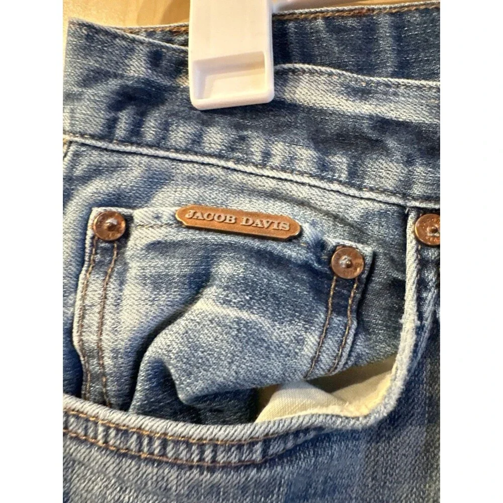 Jacob Davis medium-wash denim jeans featuring a distinct copper-toned 30x34